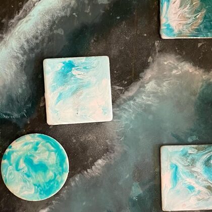 Close-up of epoxy surface with bluish marine pigments