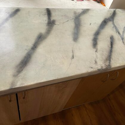 Epoxy coating imitating marble surface 4mm thick on a laminated surface