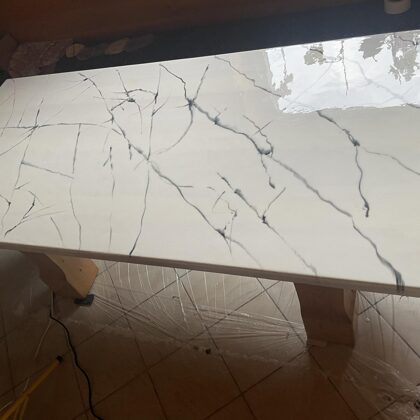 Marble imitation on a pine table