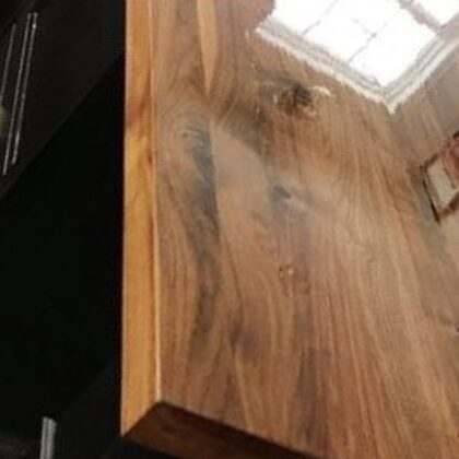 Solid wood tabletop coated with clear epoxy