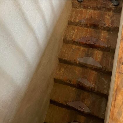 The brick staircase was renovated, the damaged steps were replaced with transparent epoxy