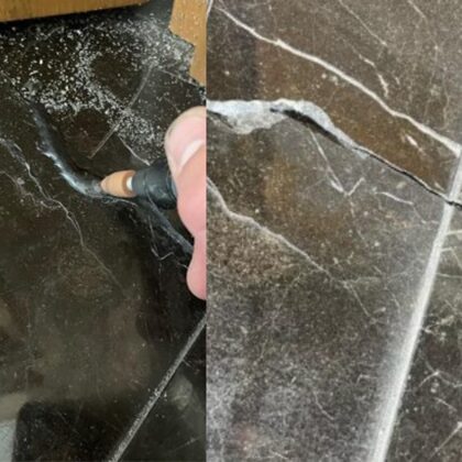 Restoration of marble floor tiles, cracks with epoxy.