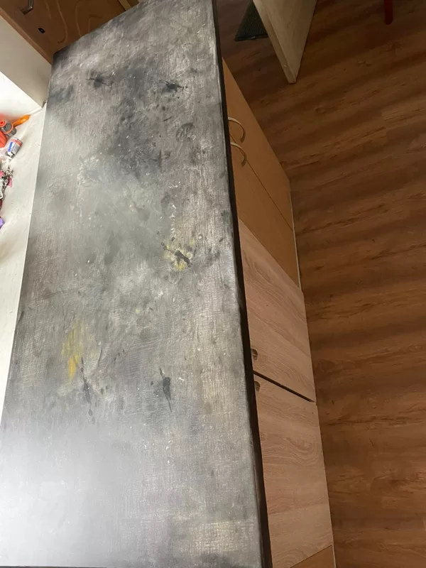 Epoxy coating imitating granite surface 4mm thick on a laminated surface