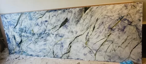 MDF covered in 3 layers with Venetian plaster.